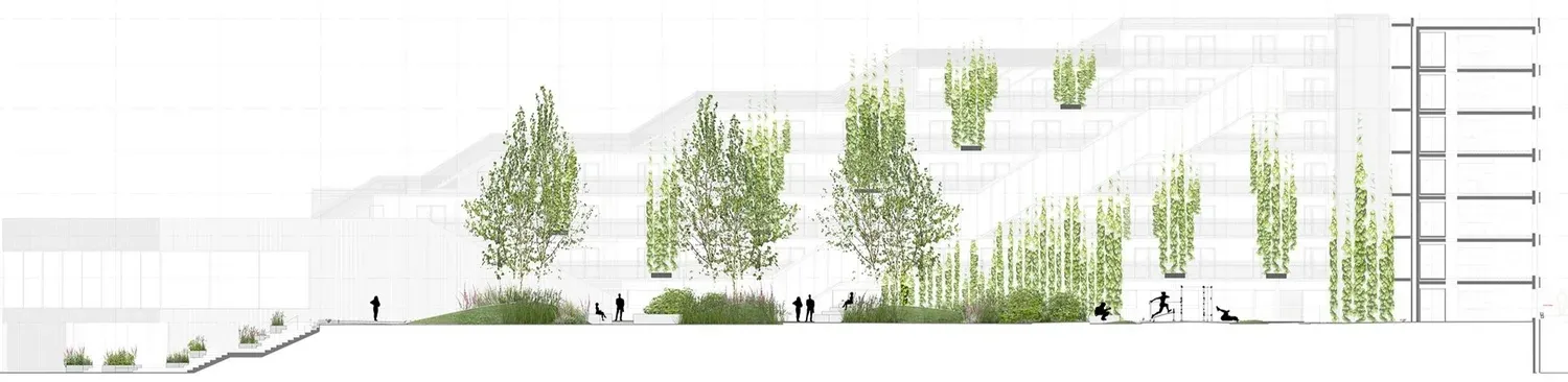 Fælles gårdrum med siddearrangementer i genbrugstræ og opholdsterrasse